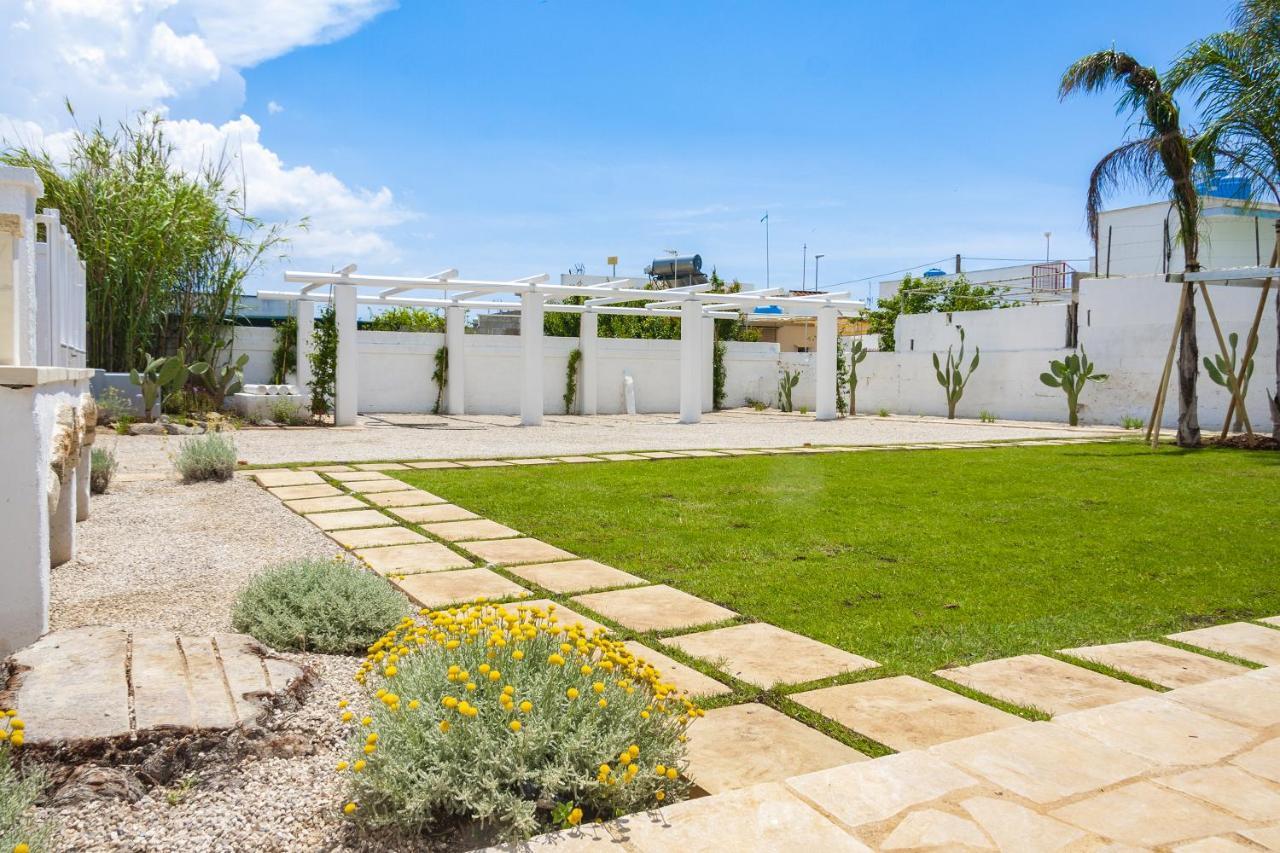 Trullo E Appartamenti Al Mare Torre San Giovanni Ugento Bagian luar foto
